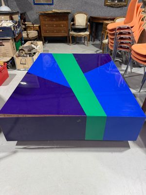 purple and blue coffee table with a green strip on top