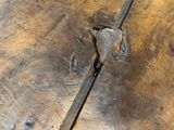 a broken piece of wood on the floor of a room