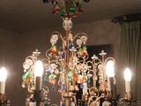 a chandelier that has a lot of glass beads hanging from it