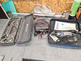 a lot of tools that are sitting on a table