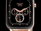 a close up of a watch on a black background