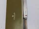 a knife and a box on a table