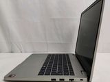 an open laptop computer sitting on top of a white table