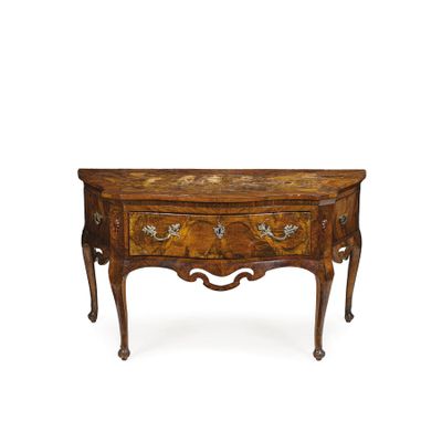 an old wooden table with drawers and drawers on it