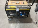 a small generator that is sitting on the floor