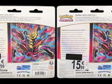two packs of pokemon trading cards on a black background
