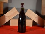 a bottle of wine that is sitting on a table