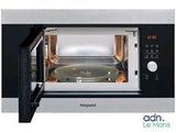 a microwave with a pan inside of it on a white background
