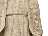 a statue of a woman with a veil on her head