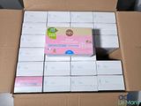a box of baby wipes sitting on top of a cardboard box
