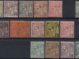 a close up of a group of stamps on a black surface
