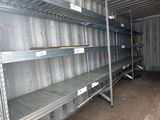 a room with shelves and shelves in the middle of it