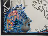 a picture of a painting of a man ' s head with graffiti on it