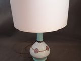 an image of a lamp with a white shade on it