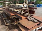 a lot of metal that is sitting in the parking lot