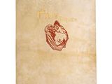 an old book with a drawing of a woman holding a baby