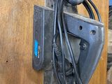 a picture of a clamp with a cord attached to it