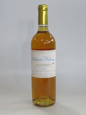 a bottle of wine that is sitting on a table