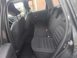 the back seats of a car are empty in the parking lot