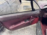 an image of a car door with the door open