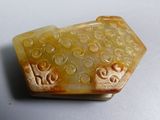 a piece of carved soap sitting on top of a table