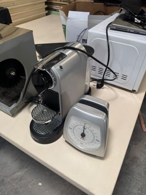 a coffee maker and a toaster on a table