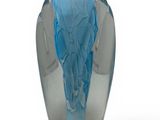 a glass vase with a blue design on it