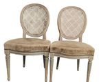 paire de chaises de salle à manger vintage à dossier en osier, de fabrication française