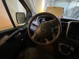 dashboard view of a car with a steering wheel and dashboard lights