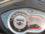 a close up of a speedometer on a motorcycle