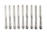 a set of six silverplated knives with handles
