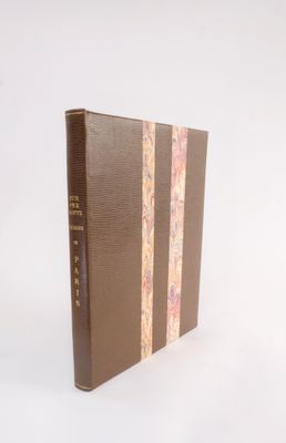 the book is sitting on a white surface with a white background