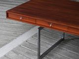 a wooden table with a drawer on top of it