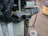an image of a machine that is in a garage