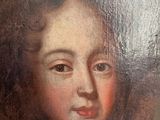 portrait of a young boy in a military uniform with a sword
