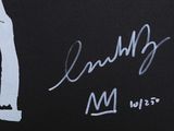 a close up of a black shirt with white writing on it