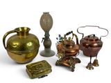 many different types of vases and other items on the table