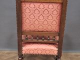 an old wooden chair with pink upholstered upholstered upholstered upholstered upholstered upholstered upholstered upholstered uphol