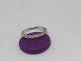 a ring that is sitting on top of a purple object