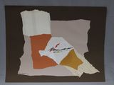 a picture of a torn piece of paper on a table