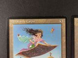 two cards with a picture of a woman riding on a flying object