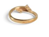 an image of a close up of a gold ring on a white background