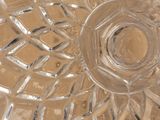 a glass plate with a circular design on it