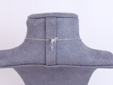 a close up of a necklace on a mannequin head