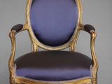 an image of a purple and gold chair on a grey background