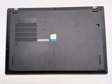 a black laptop with a blue sticker on the back of it