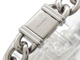 an image of a close up of a wrist with a chain around it