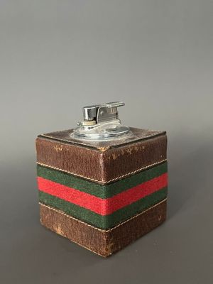 a brown box with a red, green and red stripe on it