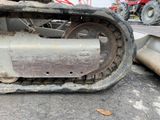 a close up of a tractor that has been left on the ground