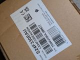 a box with a barcode on it sitting on a table